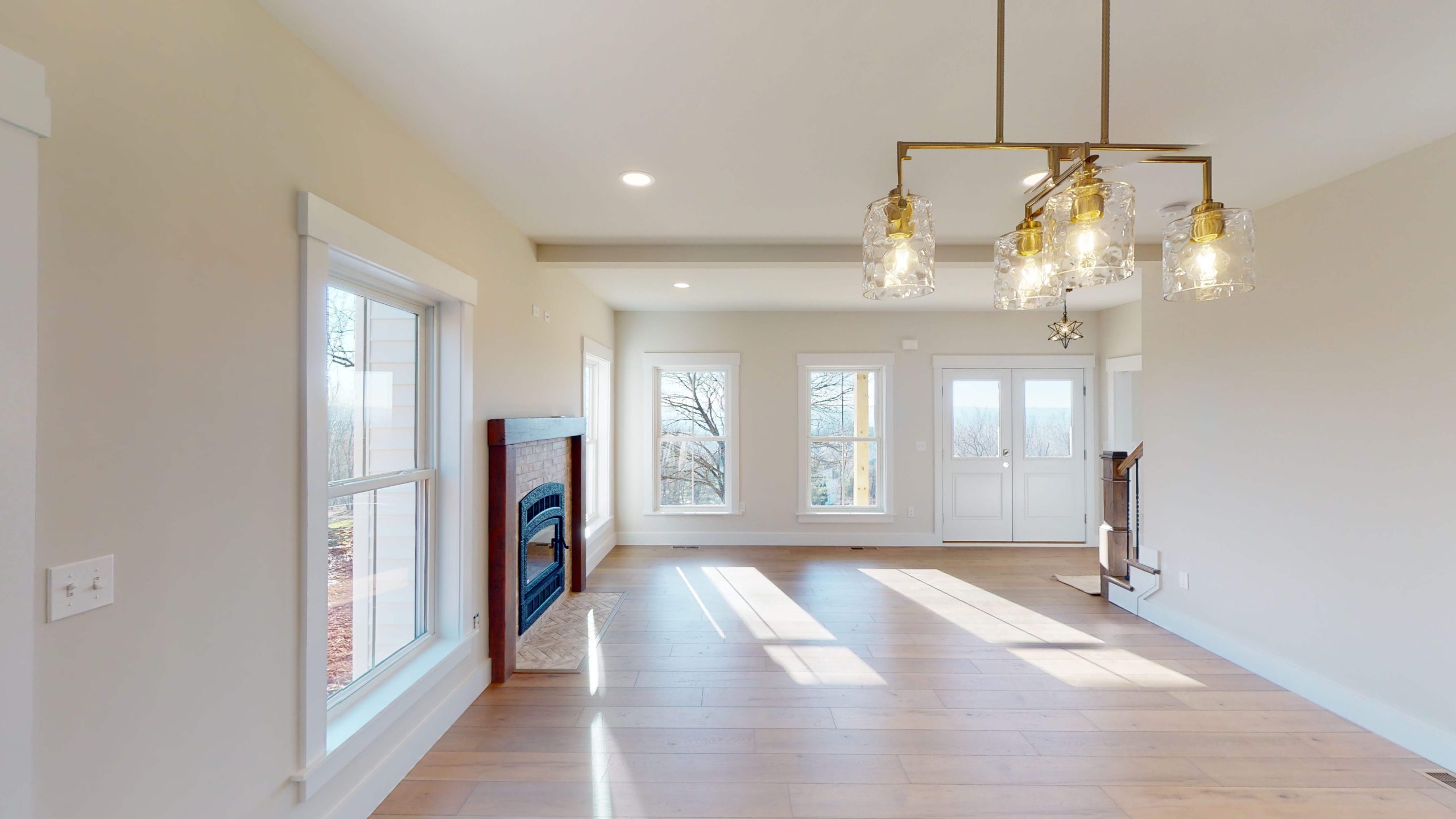 white room with big clear windows letting light in